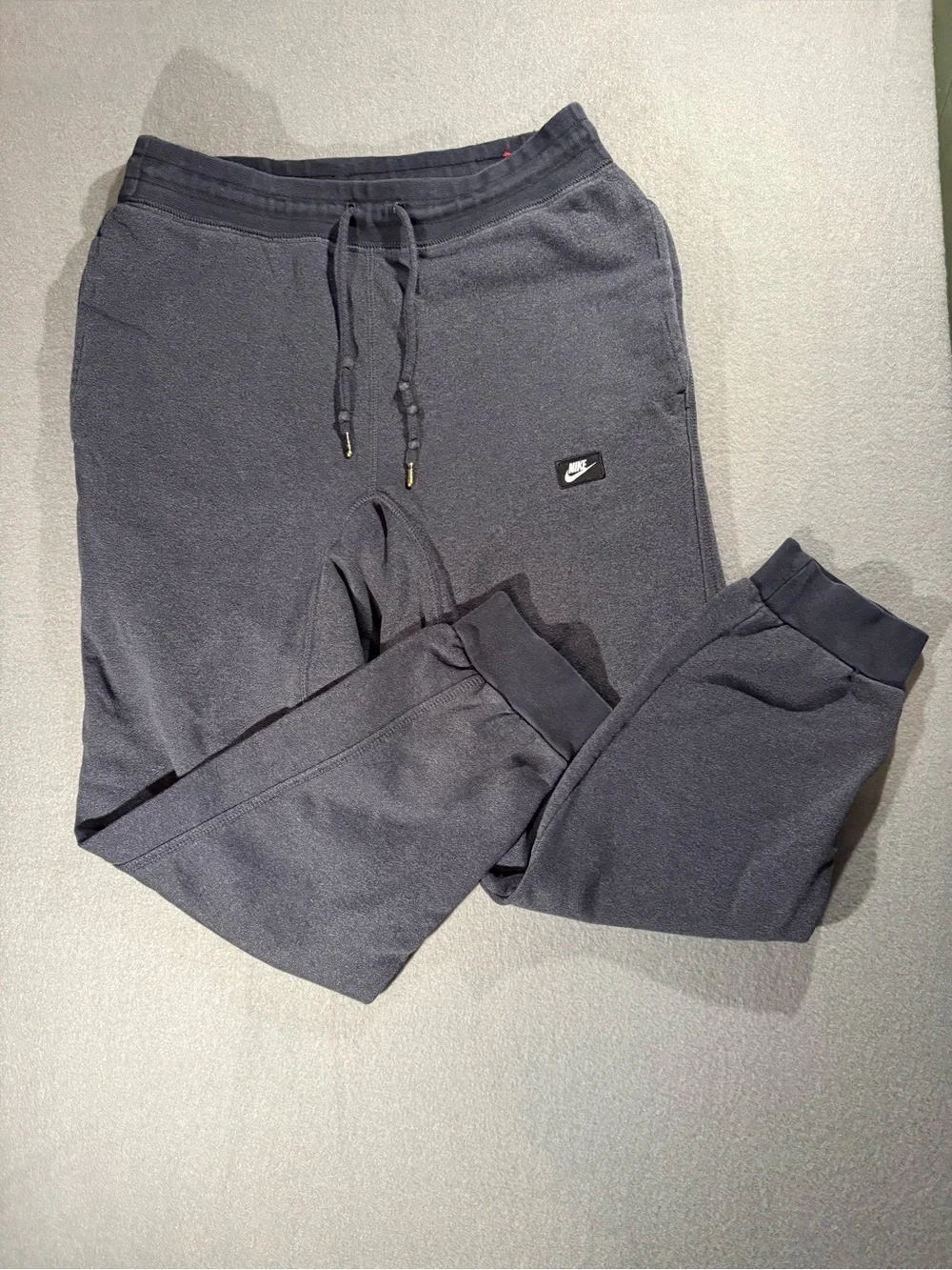 Nike Black Fleece Jogger Pants with Red Logo Tag